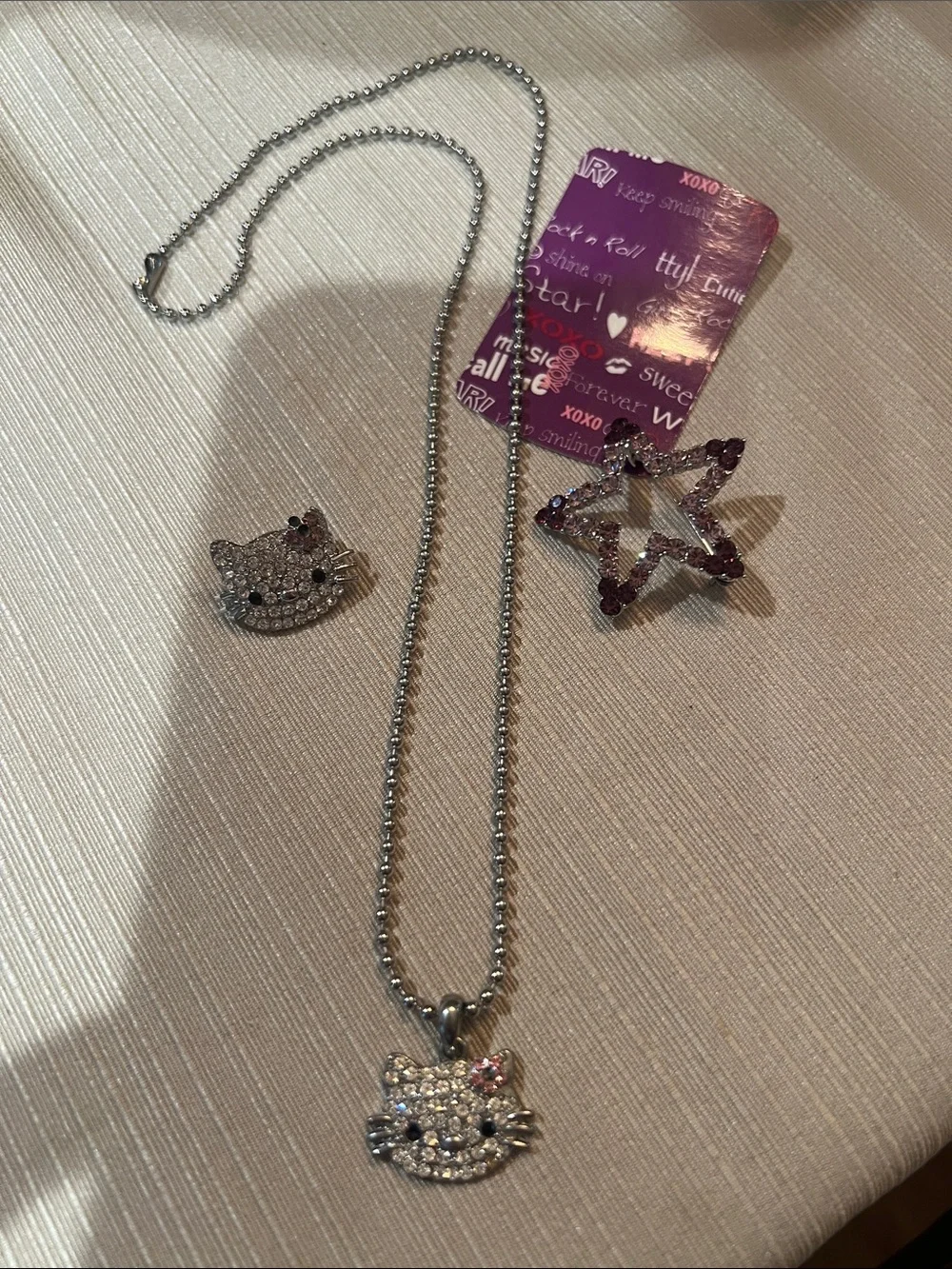 Crystal Hello Kitty Face Necklace & Matching pin. Plus purple star pin!